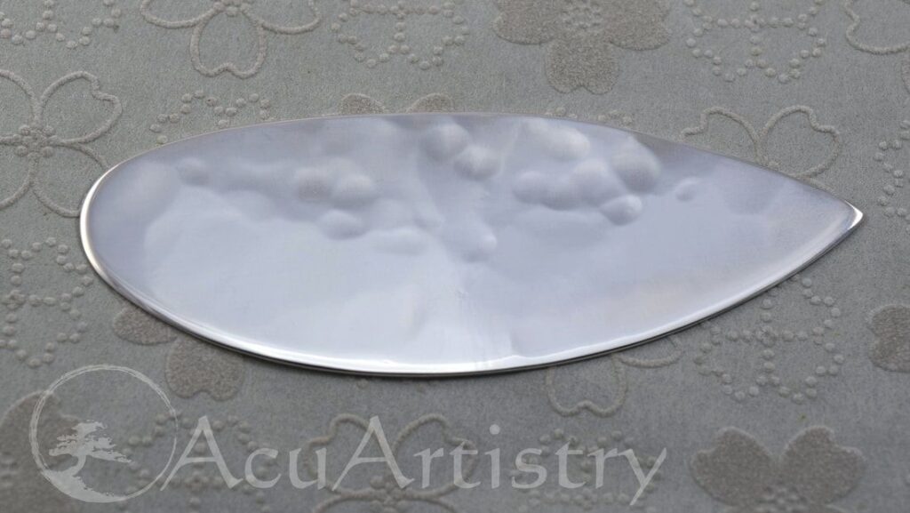 Hand hammered silver chokishin acupuncture tool