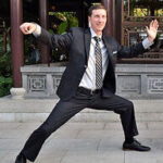 Mark Parzynski doing taiji in a formal clothes