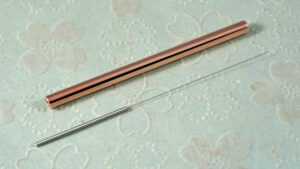 Copper guide tube with an acupuncture needle